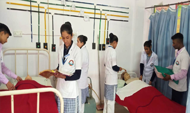 An image of students performing a regular check up on their patients.
